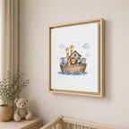 A framed nursery art print featuring Noah's Ark with cartoon animals, hanging on a beige wall above a wooden crib next to a teddy bear and a potted plant.