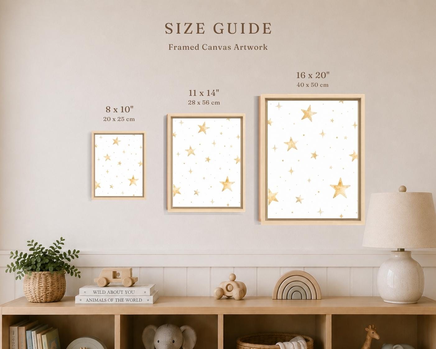 A size guide graphic showing three framed canvas art prints with gold star patterns on a white background, labeled 8 x 10 inches, 11 x 14 inches, and 16 x 20 inches, mounted on a wall above a wooden shelf with toys and a lamp.