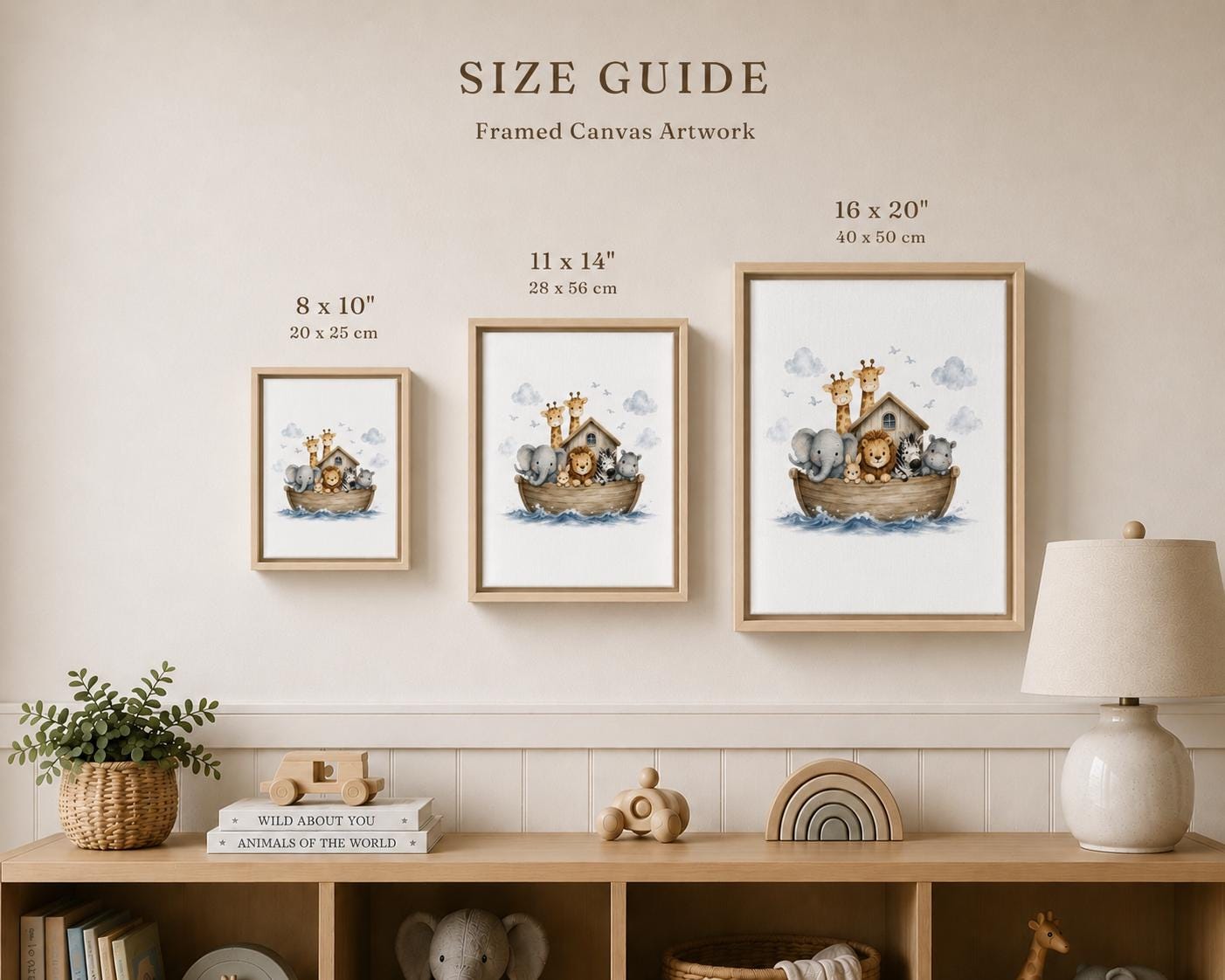 A size guide display showing three framed canvas prints of Noah's Ark in different sizes (8x10, 11x14, and 16x20 inches) mounted on a beige wall above a wooden shelf with nursery decor.