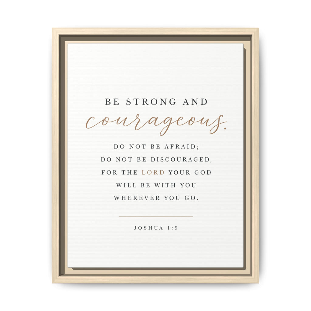 A framed inspirational Bible print featuring the quote 'BE STRONG AND courageous. DO NOT BE AFRAID; DO NOT BE DISCOURAGED, FOR THE LORD YOUR GOD WILL BE WITH YOU WHEREVER YOU GO.