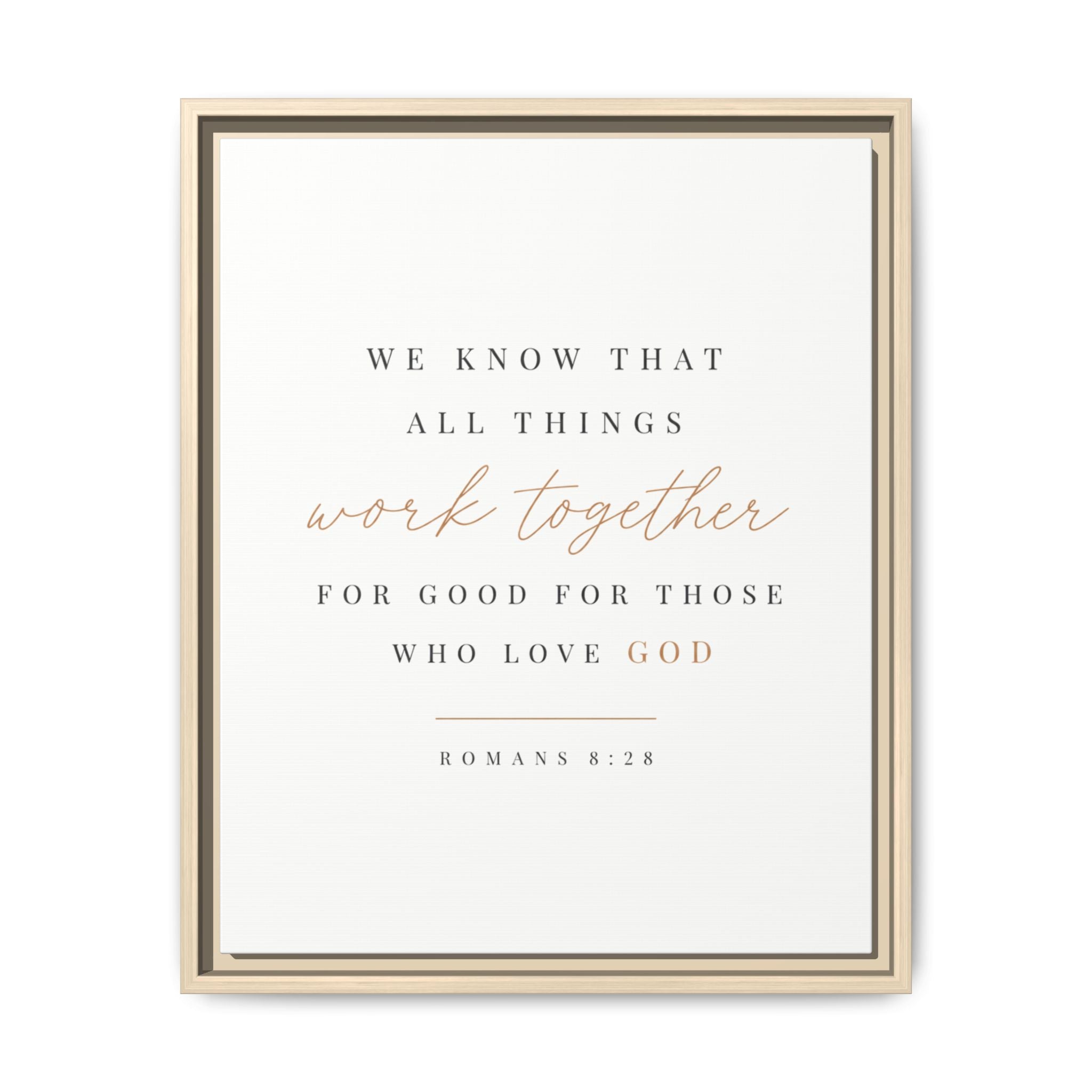 A framed typographic wall art print with the Bible verse Romans 8:28. The print features dark gray text with 'work together' in a rose-gold cursive script, housed in a light beige double-frame design against a clean white background.