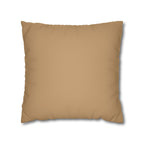 Tan pillow on a white background