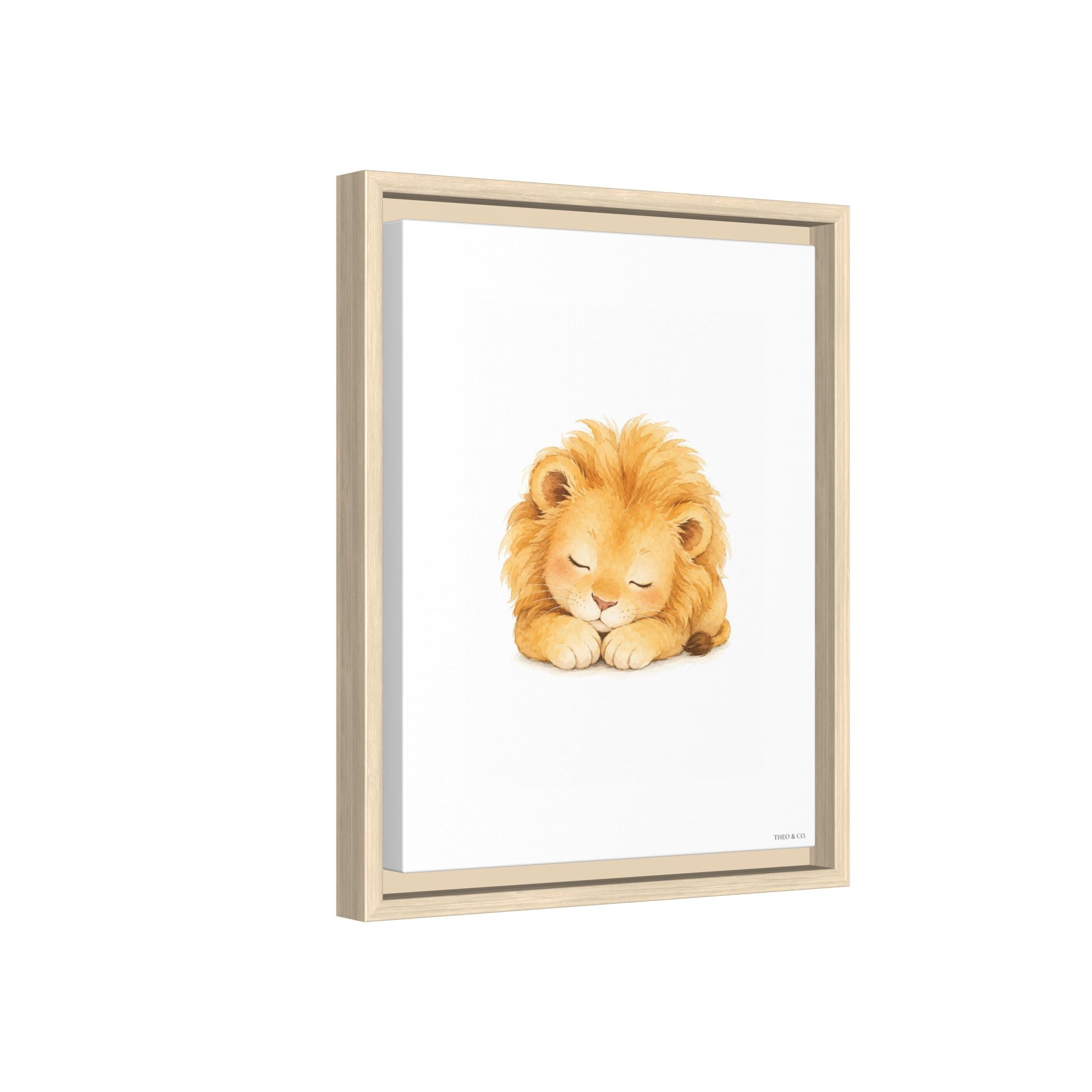 A framed art print featuring a watercolor illustration of a sleeping golden lion on a white background, housed in a light natural wood frame.