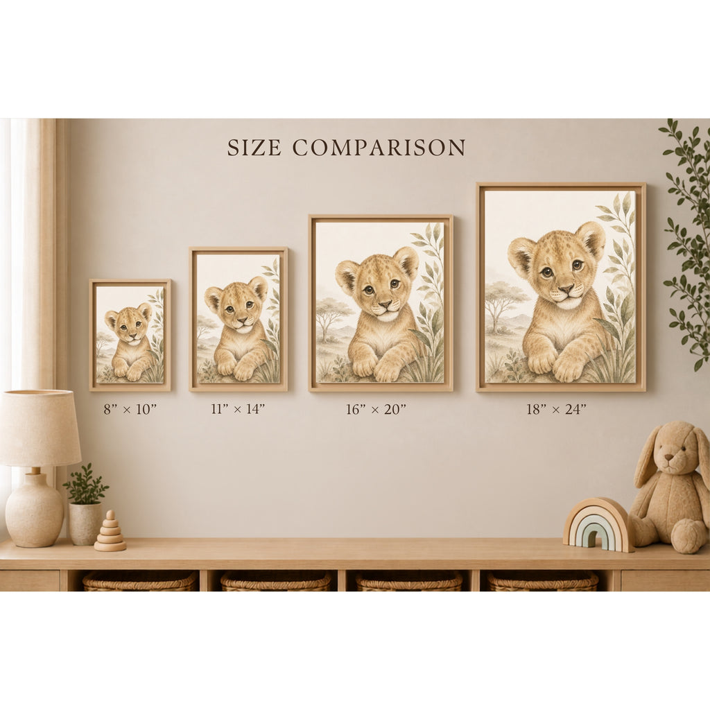 Four framed lion cub wall art prints shown in a nursery-like room, labeled with sizes from 8" x 10" to 18" x 24" under the heading 'SIZE COMPARISON.' The scene includes a lamp, shelf, basket, and stuffed bunny, so this is not a clean product-only shot.