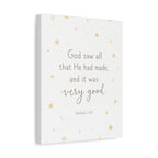 A square canvas wall art print with a white background, featuring the Bible verse 'God saw all that He had made, and it was very good. Genesis 1:31' in brown text, accented with small gold stars.