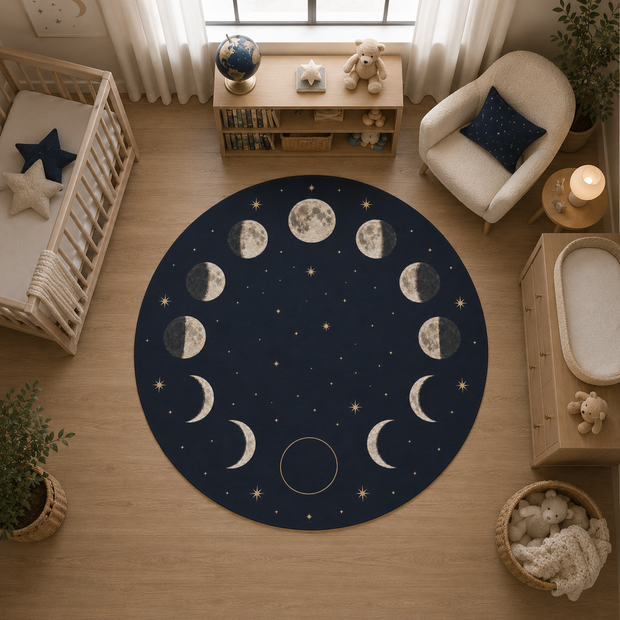 A round navy blue baby nursery rug featuring a celestial moon phase pattern with white and cream crescent moons, full moons, and small stars, shown from an overhead view in a styled nursery room.