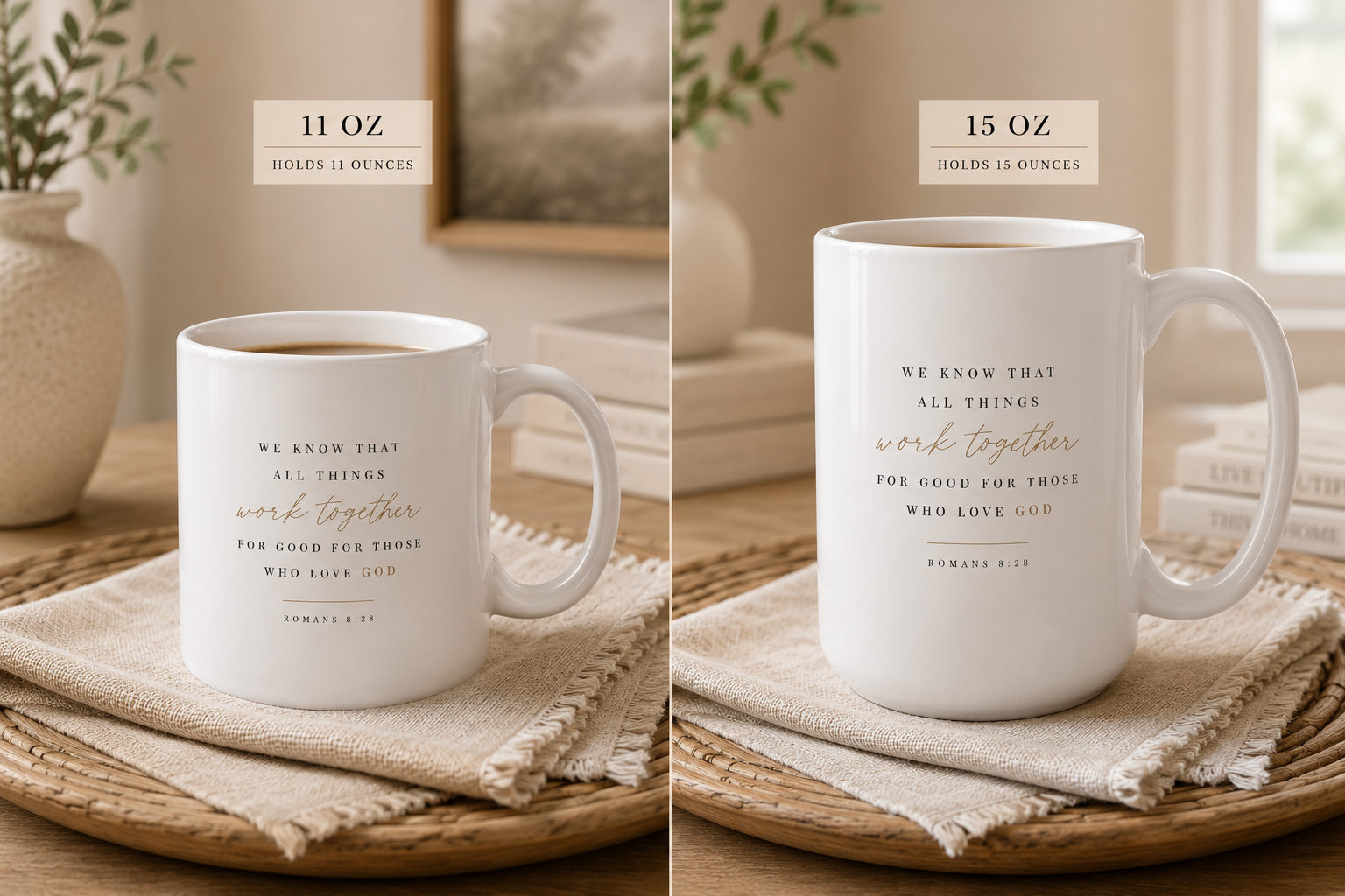 Two white ceramic mugs with gold and black inspirational Bible verse prints, shown side by side on a woven tray with a beige cloth. The left mug is labeled 11 OZ and the right mug is labeled 15 OZ.