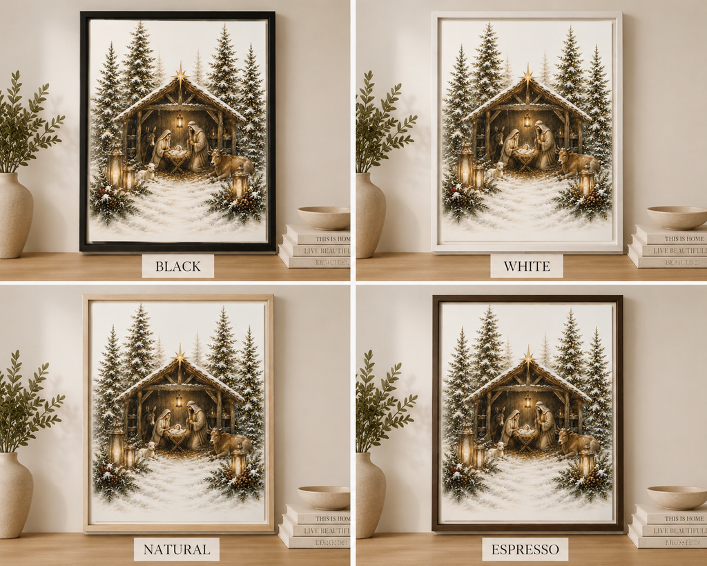 Four framed art prints showing a snowy winter nativity scene with pine trees, each labeled with a finish option: BLACK, WHITE, NATURAL, and ESPRESSO. The frames and prints are arranged in a 2x2 grid on a beige wall above a wooden surface with books and vases.