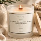A lit vanilla scented candle in a frosted glass jar with a wooden wick, featuring a white label with black text that reads 'THEO & CO. AS FOR ME AND MY HOUSE, WE WILL SERVE THE LORD.