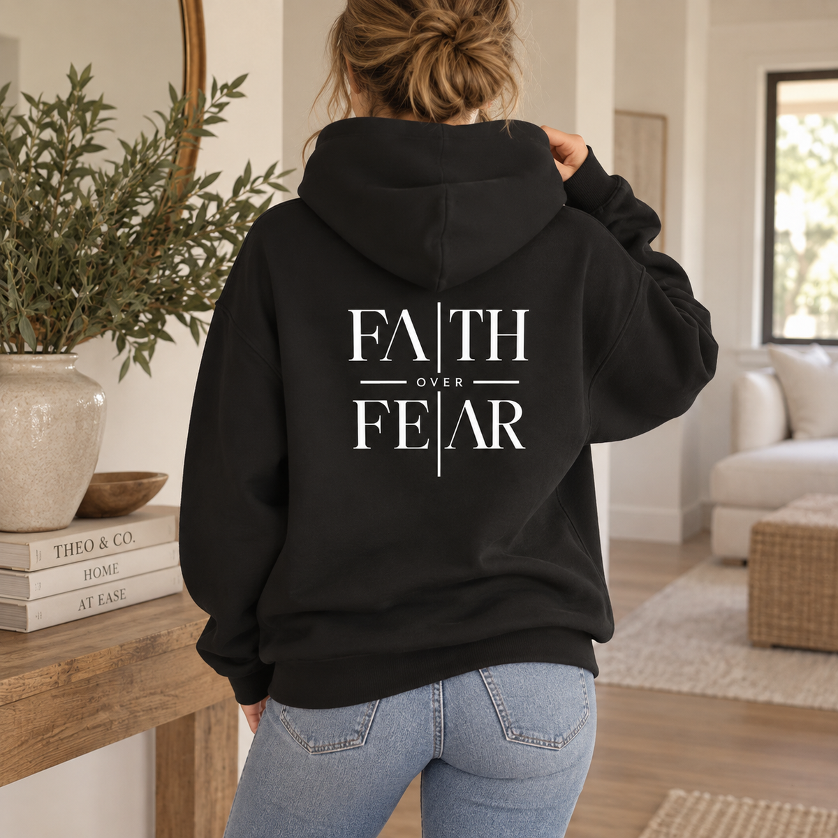 Faith Over Fear hoodie with a minimalist cross at the chest