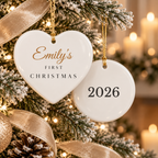 Baby's First Christmas personalized white ceramic ornament with baby's name in script and 2026 on the back