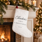 Baby's First Christmas personalized white stocking with baby's name in script and First Christmas 2026