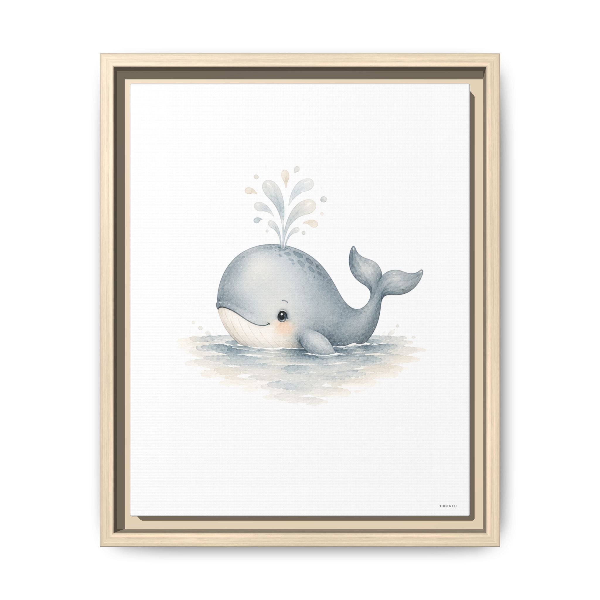 A framed watercolor art print featuring a cute gray baby whale swimming in light blue water with a small splash, set in a light beige double-frame against a white background.