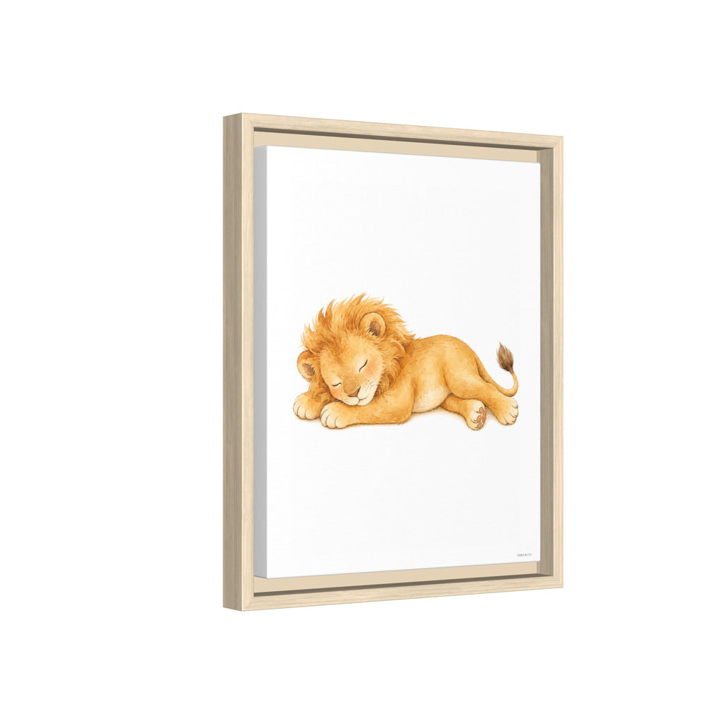 A framed watercolor art print of a sleeping lion cub, shown at a slight angle against a plain white background.
