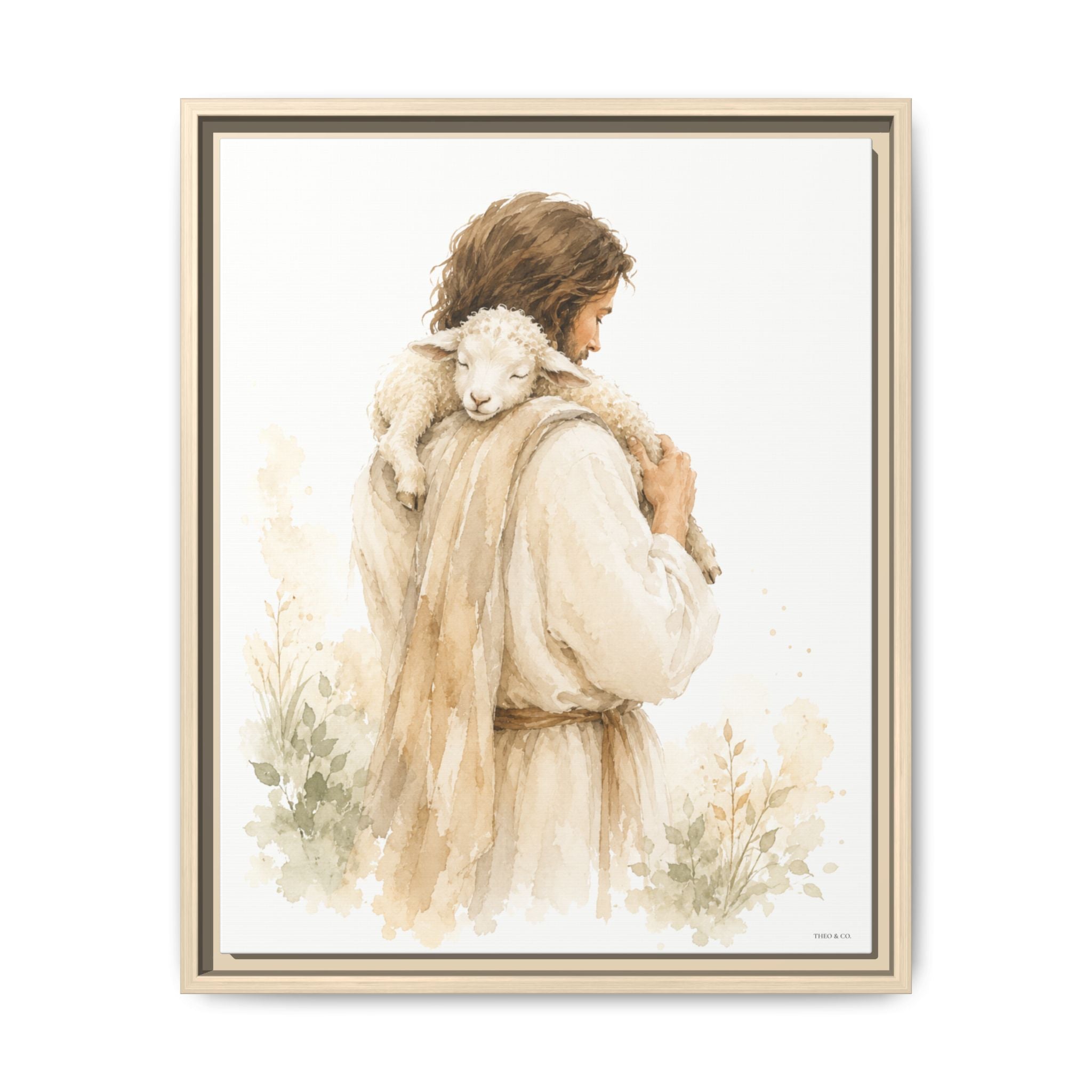 A framed watercolor-style art print showing a man in soft beige robes carrying a white sheep on his shoulders, set against a clean white background.